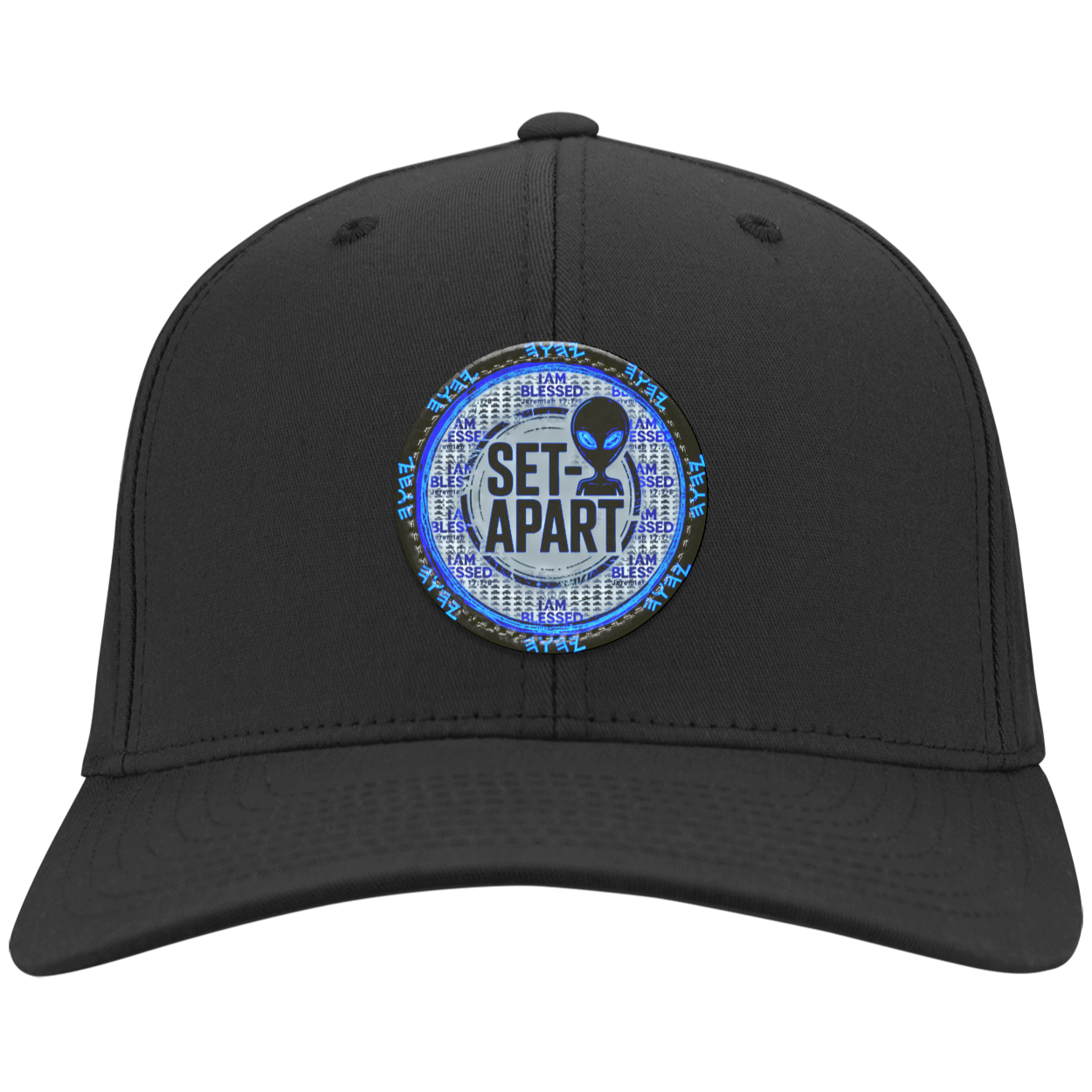 Royal blue cap with a small circular design featuring text and an alien figure on a white background.