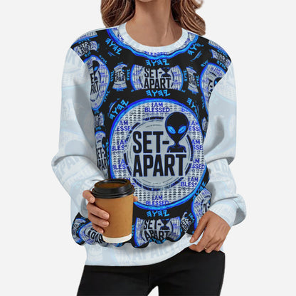 Close-up of a blue and black sweatshirt featuring a circular alien graphic and "SET-APART" text.