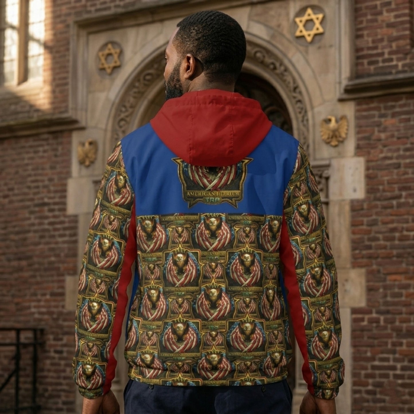 Rear view of a man wearing a red, blue, and eagle-patterned windbreaker, standing before a stone archway with decorative gold symbols.