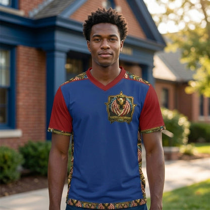 A man wears a blue V-neck shirt with red sleeves and an eagle crest. The sides and trim feature a patterned eagle and flag motif.
