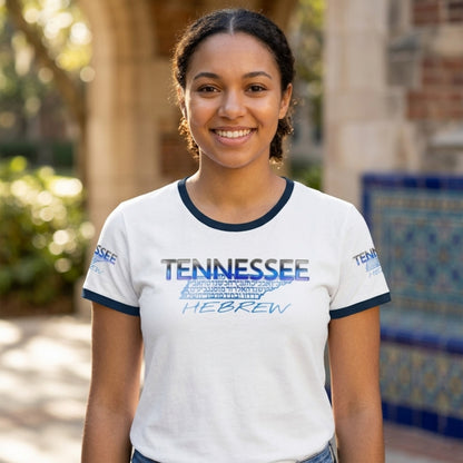 A smiling woman wears a white ringer tee featuring "TENNESSEE" in blue gradient above a map of the state filled with Hebrew text and the word "HEBREW."
